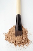 Beige powder with brush