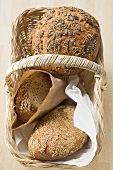 Three different types of bread in bread basket
