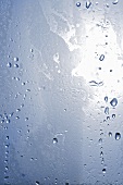 Drops of water on a sheet of glass