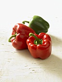 Two red peppers and one green pepper