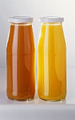 Two bottles of fruit juice