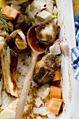 Roasted veal bones and vegetables (making veal stock)