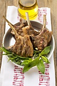 Grilled lamb cutlets, fresh herbs, olive oil
