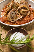 Belly pork rolls with tomato pesto and rosemary