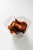 Dried tomatoes in cellophane bag
