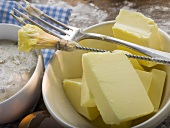 Baking ingredients (butter, yeast), pastry brush, fork