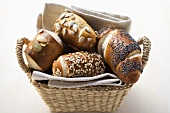 Assorted pretzel rolls (or lye rolls) in bread basket