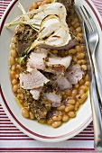 Spicy pork chop with garlic and beans