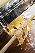 Home-made ribbon pasta in pasta maker