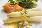 White asparagus with smoked salmon, egg sauce & salad leaves