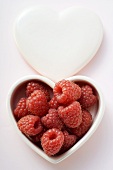 Raspberries in heart-shaped dish