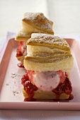 Puff pastries with raspberry ice cream and raspberry jam