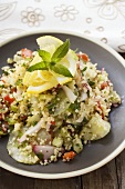 Couscous salad with vegetables, lemon and mint
