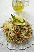 Couscous salad with vegetables, lemon and mint