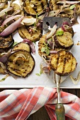 Grilled aubergines with onions