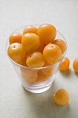 Mirabelles in and beside a glass