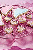 Assorted heart-shaped biscuits on cake rack