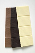 Pieces of three different chocolate bars