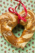 Heart-shaped lye roll with red bow