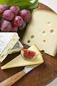 Cheese board with fig and grapes
