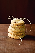 A pile of cranberry cookies, tied together