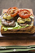 Beef steak and tomatoes on toast