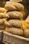 Assorted bread rolls in baskets at a market