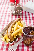 Currywurst (sausage with ketchup & curry powder), chips & cola