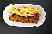 Currywurst (sausage with ketchup & curry powder) & chips (overhead)
