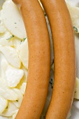 Frankfurters with potato salad (close-up)