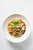 Macaroni with mince sauce, Parmesan and basil
