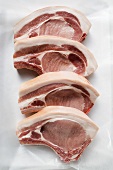 Several pork chops in a row