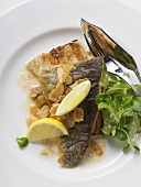 Fried trout with flaked almonds