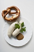 Weisswurst (white sausages) with mustard and pretzel