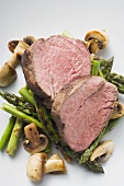 Beef fillet with green asparagus and mushrooms