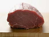 Beef fillet on chopping board