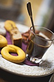 Glass of espresso and assorted Italian biscuits