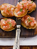 Bruschetta on chopping board