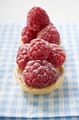 Two raspberry tarts