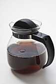 Black coffee in glass jug