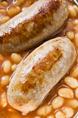 Baked beans with sausages (close-up)