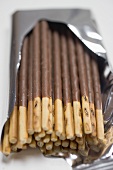 Chocolate sticks in opened packaging