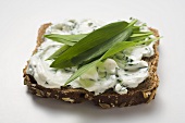 Quark and ramsons (wild garlic) on wholemeal bread