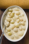 Pearl onions in cream sauce (overhead view)