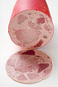 Schinkenwurst (ham sausage) with a slice cut