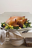 Stuffed turkey with herbs, grapes and patty pan squashes