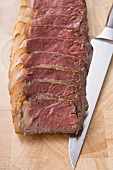 Beef steak with fatty edge, sliced