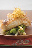 Fish fillet with spring onions