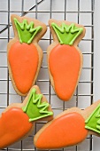 Easter biscuits (carrots) on cake rack