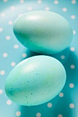 Two pale blue Easter eggs